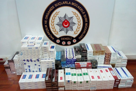 Polisten sahte para ve kaçak sigara operasyonu