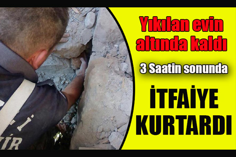 Yıkılan evin altında kalan kediyi itfaiye kurtardı