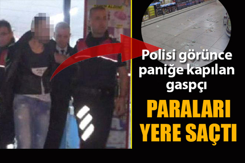 Polisi görünce cama çarpan gaspçı, paraları yere saçtı