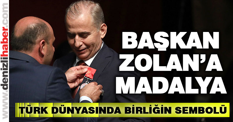 Başkan Osman Zolan’a madalya