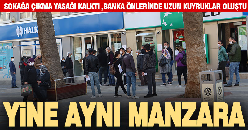 Sokağa çıkma yasağının ardından bankalarda uzun kuyruklar oluştu