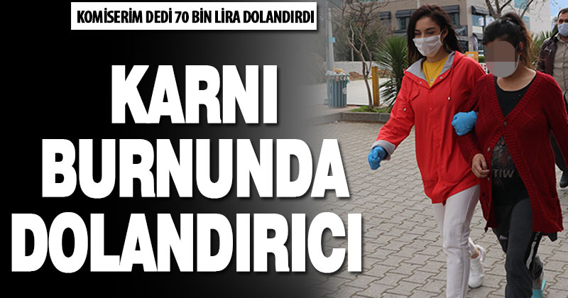 Karnı burnunda dolandırıcı yakalandı