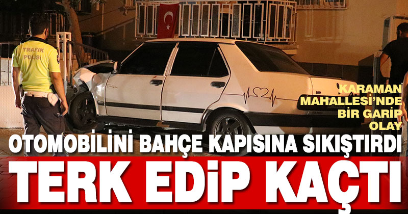 Çarptığı bahçe kapısına sıkışan otomobilin sürücüsü aracı terk edip kaçtı