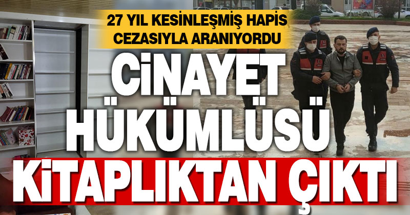 Cinayet hükümlüsü kitaplıktaki gizli bölmede yakalandı