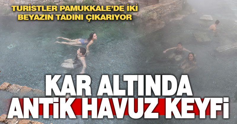 Pamukkale’de turistler kar altında termal havuza girdi