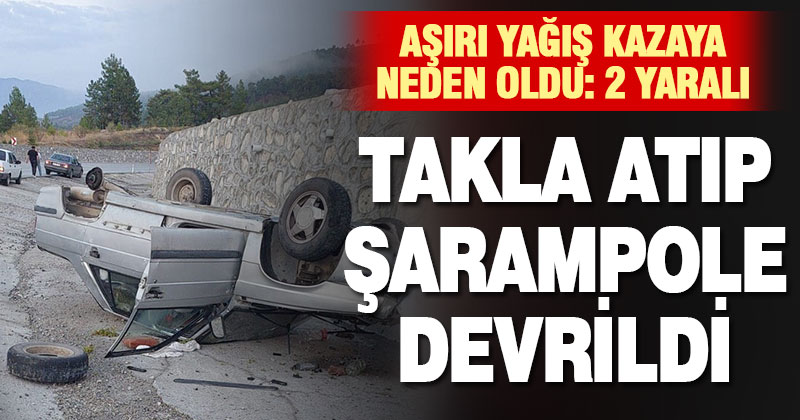 Takla atan otomobil şarampole devrildi